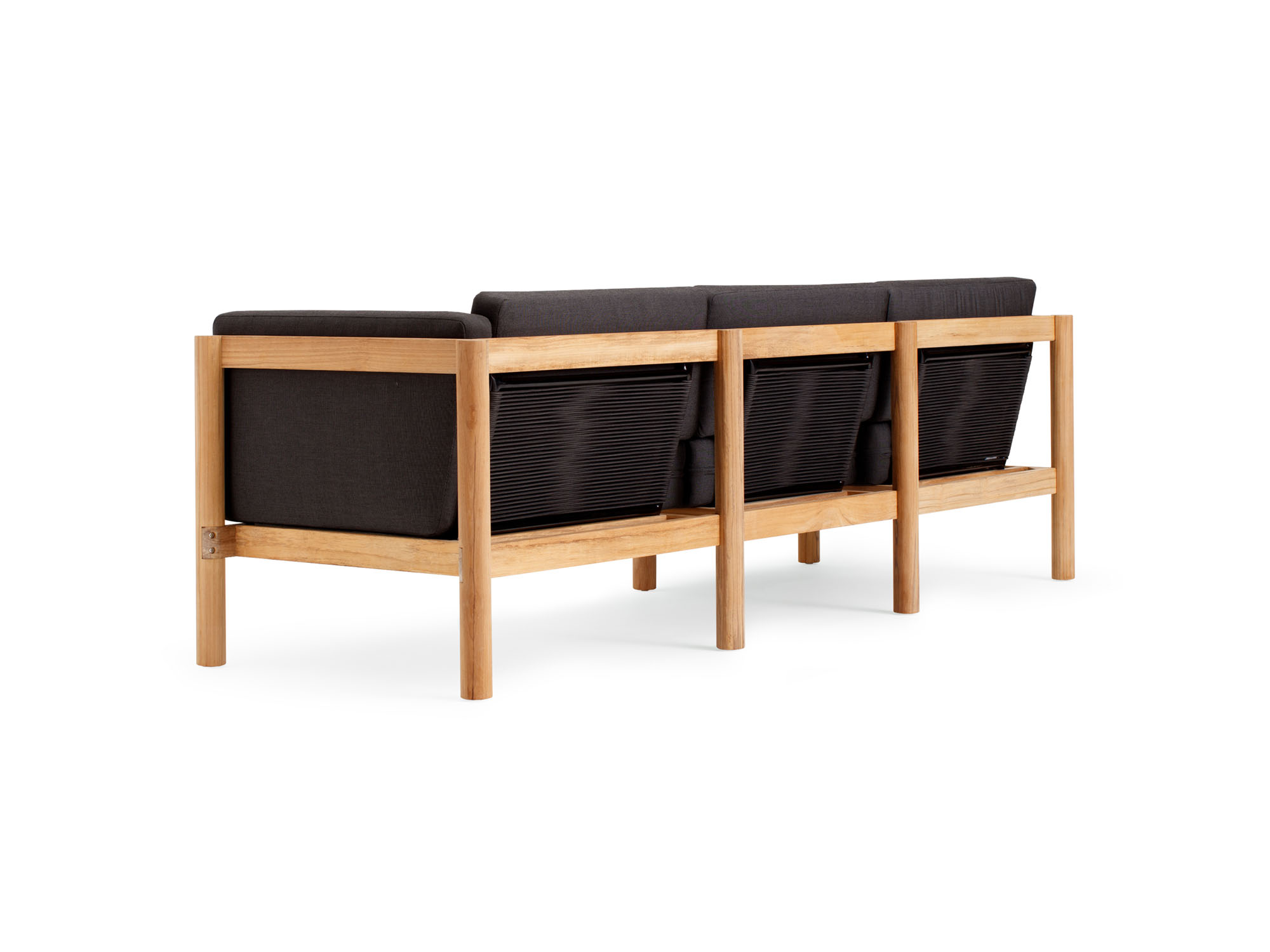 Back angle view of outdoor sofa with black arm cushions